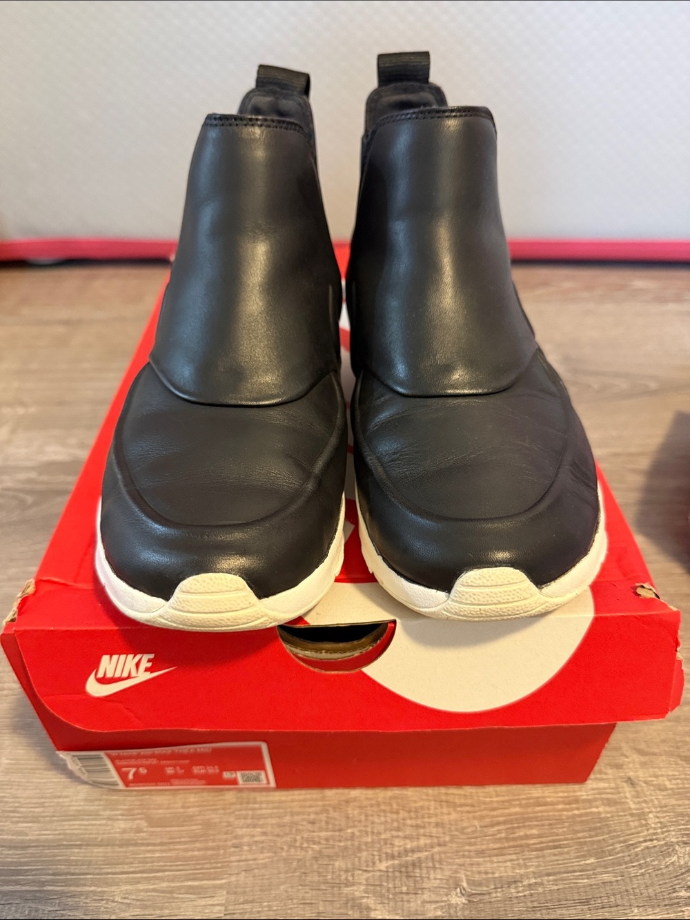 Nike Women’s Slip-On Black Leather Boot
